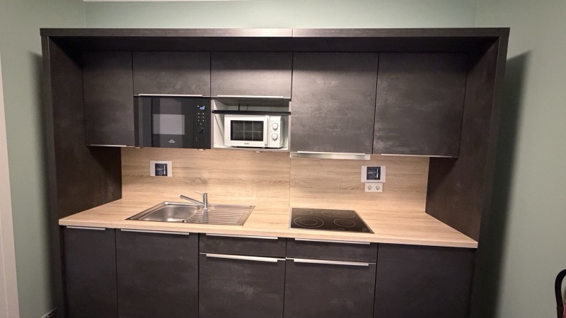 Shared kitchen at Neo Hostel
